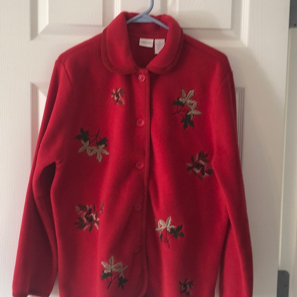 Cherokee red fleece button front jacket with leaf embellishments on the front